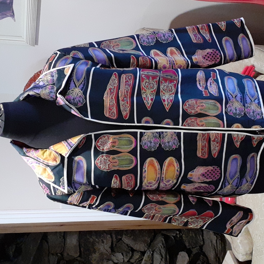 Victor Costa jacket and Muchel Germain tote.